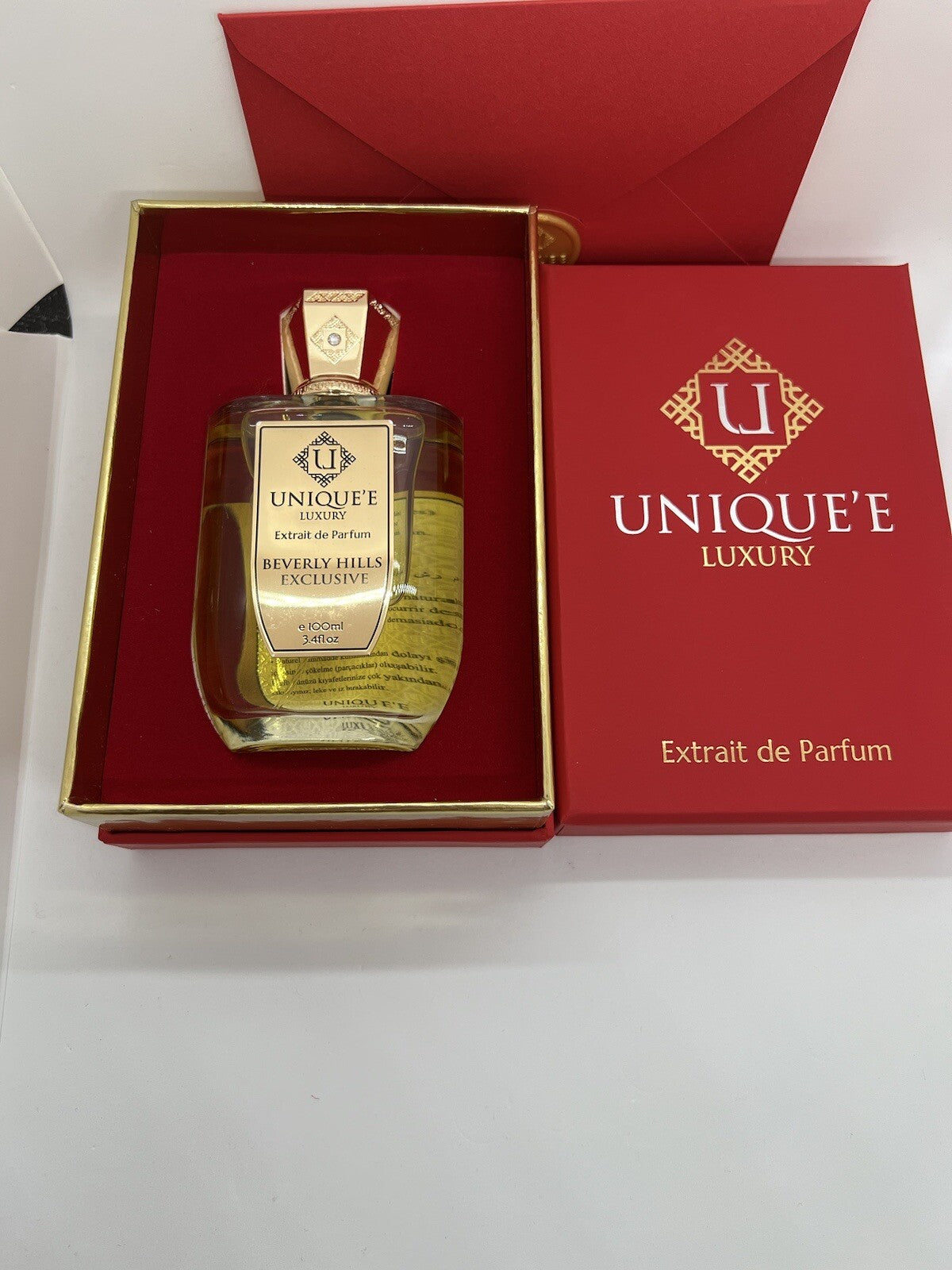 UNIQUE'E LUXURY BEVERLY HILLS EXCLUSIVE EXTRAIT DE PARFUM 100ML OPEN BOX SEE PIC0
